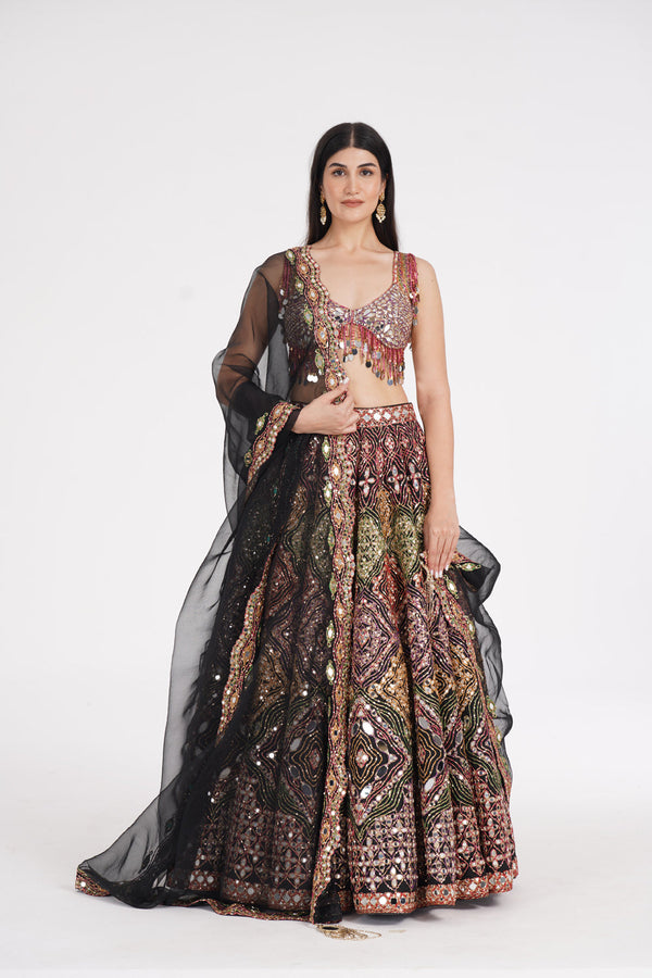 Matte Black Lehenga Embellished Using Warm Pastels