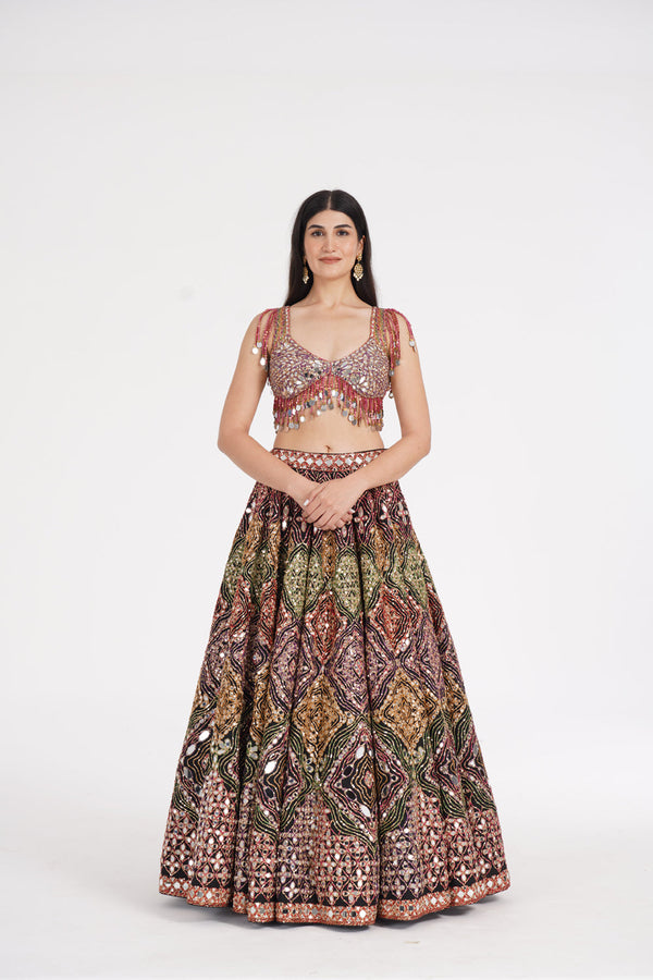 Matte Black Lehenga Embellished Using Warm Pastels