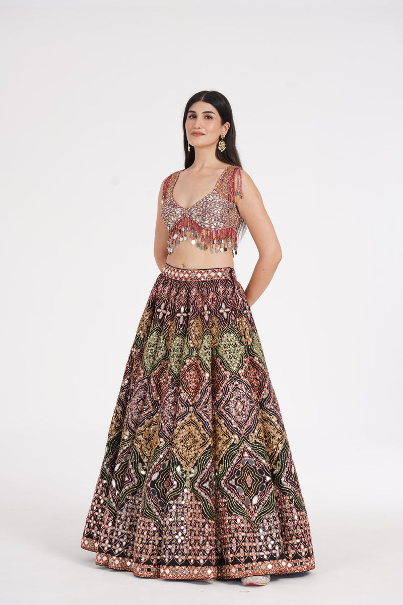 Matte Black Lehenga Embellished Using Warm Pastels