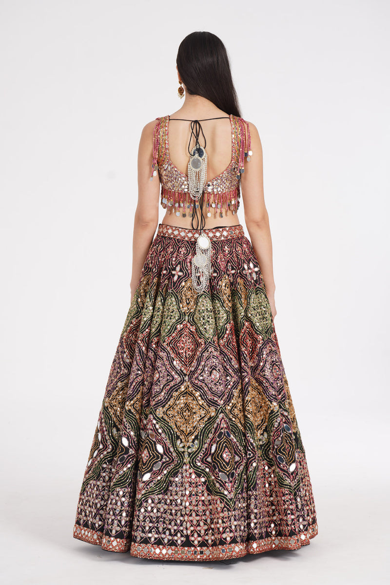 Matte Black Lehenga Embellished Using Warm Pastels