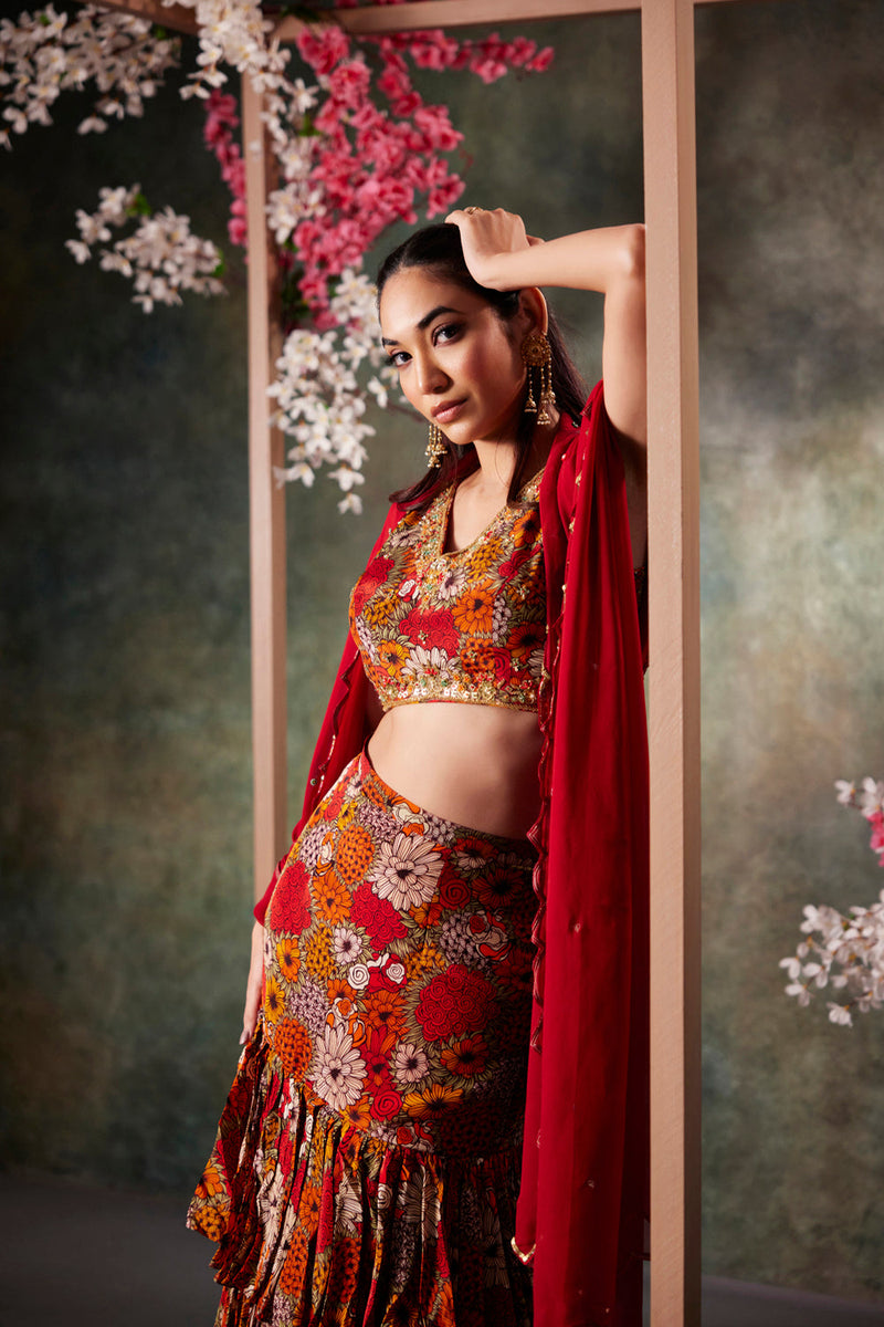 Orange Printed Choli, Ruffle Skirt And Dupatta Set With Embroidery