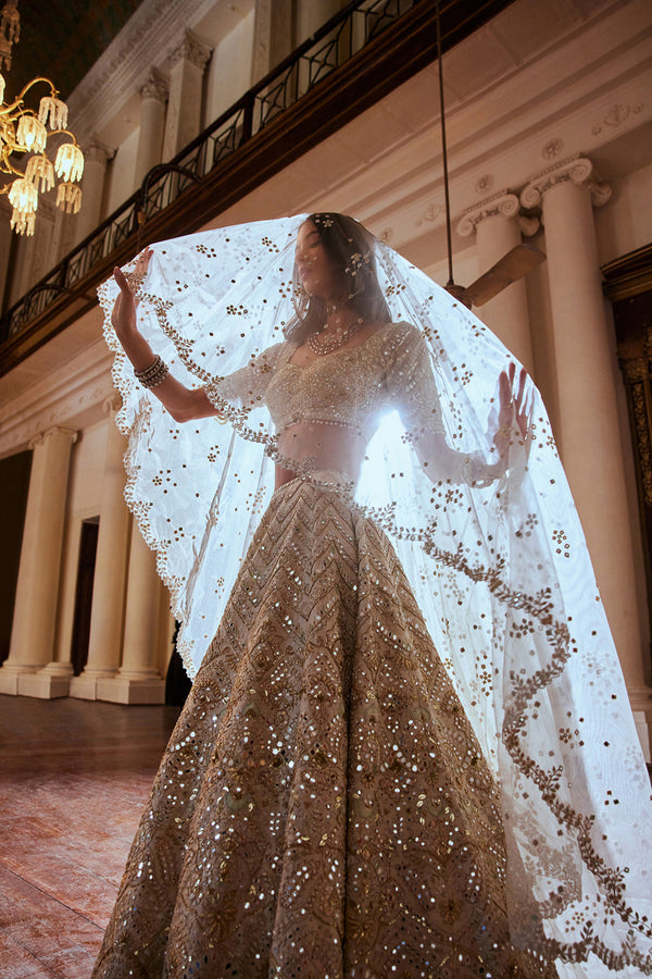 Cream Lehenga With Green Highlighting