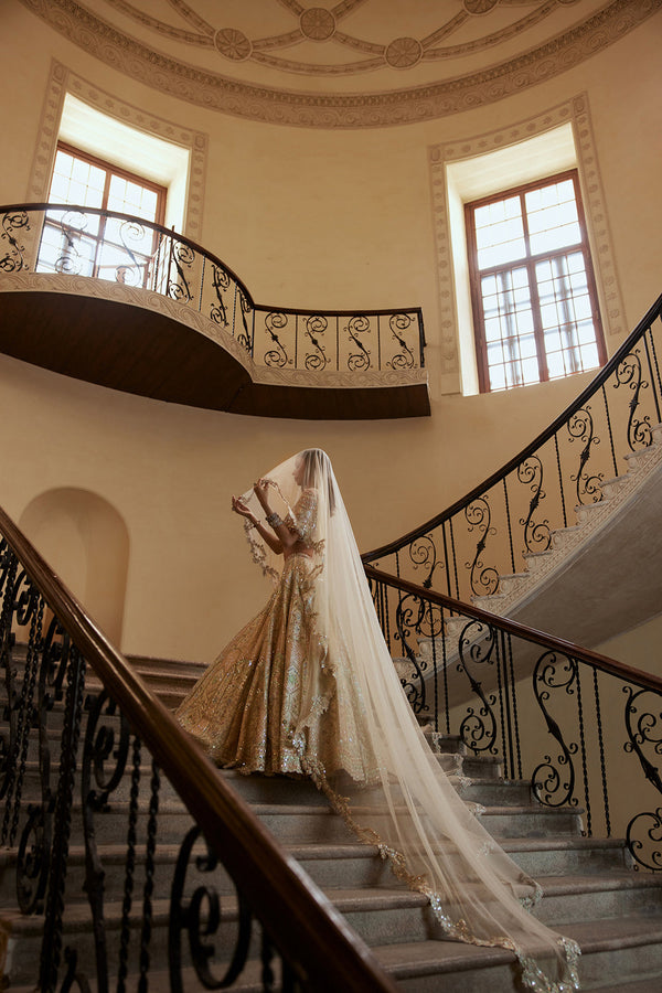 Ivory Lehenga With Multi Coloured Embroidery