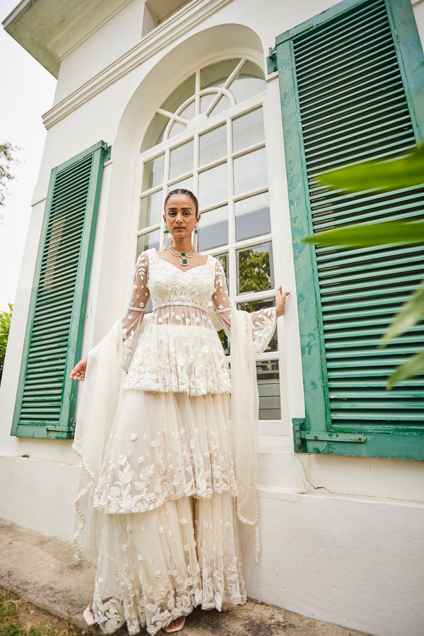 Pearled Ivory Peplum & Layered Sharara Set.