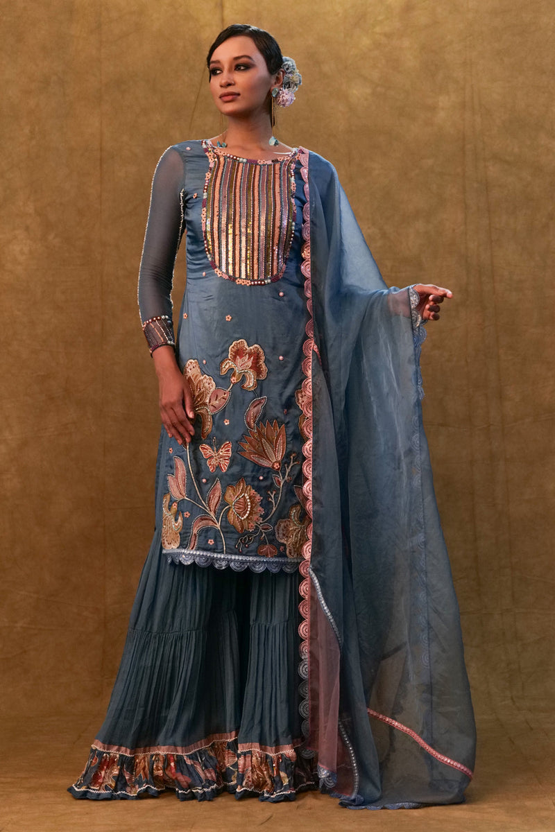 Blue Applique Work Kurta Set Paired With Flared Sharara And A Dupatta.