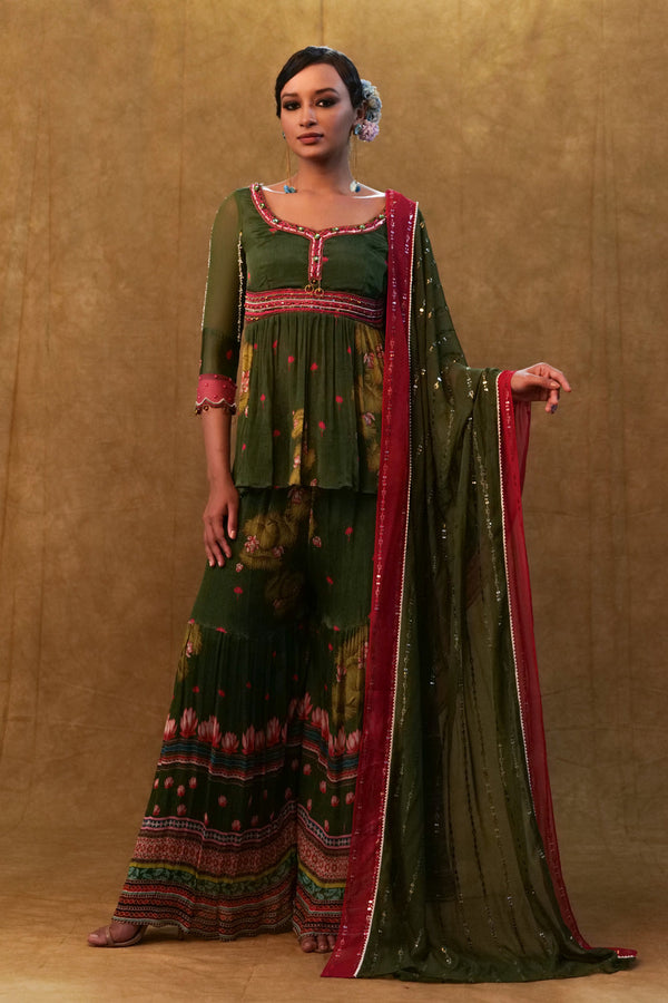 Green Printed Sharara Set Paired With Color Block Dupatta And A Peplum.