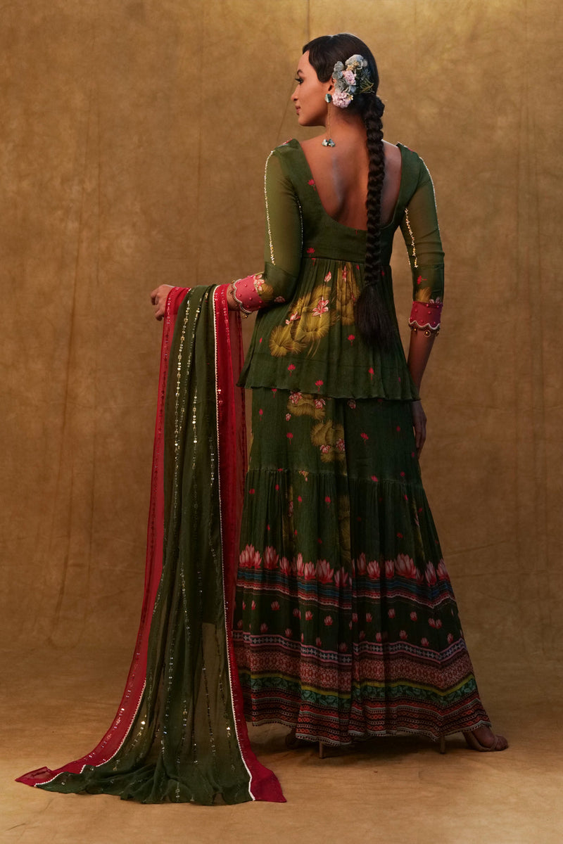 Green Printed Sharara Set Paired With Color Block Dupatta And A Peplum.