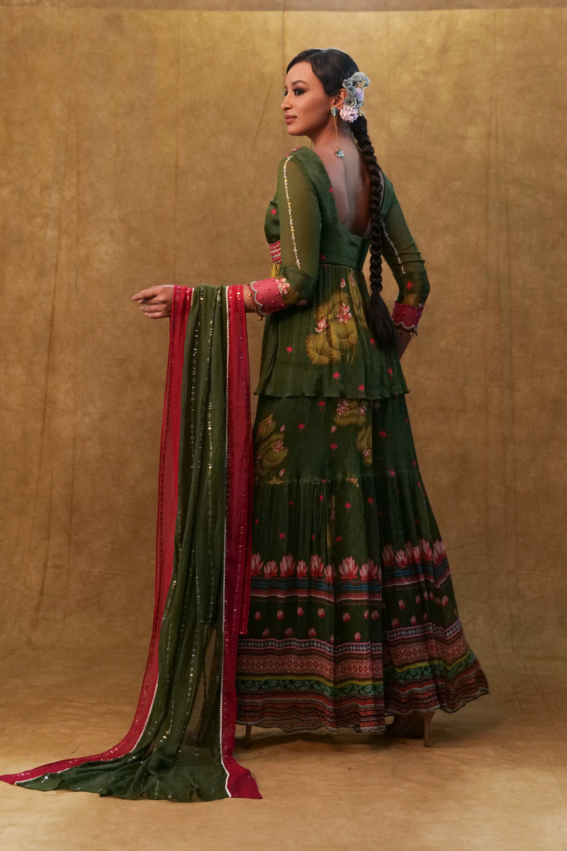 Green Printed Sharara Set Paired With Color Block Dupatta And A Peplum.