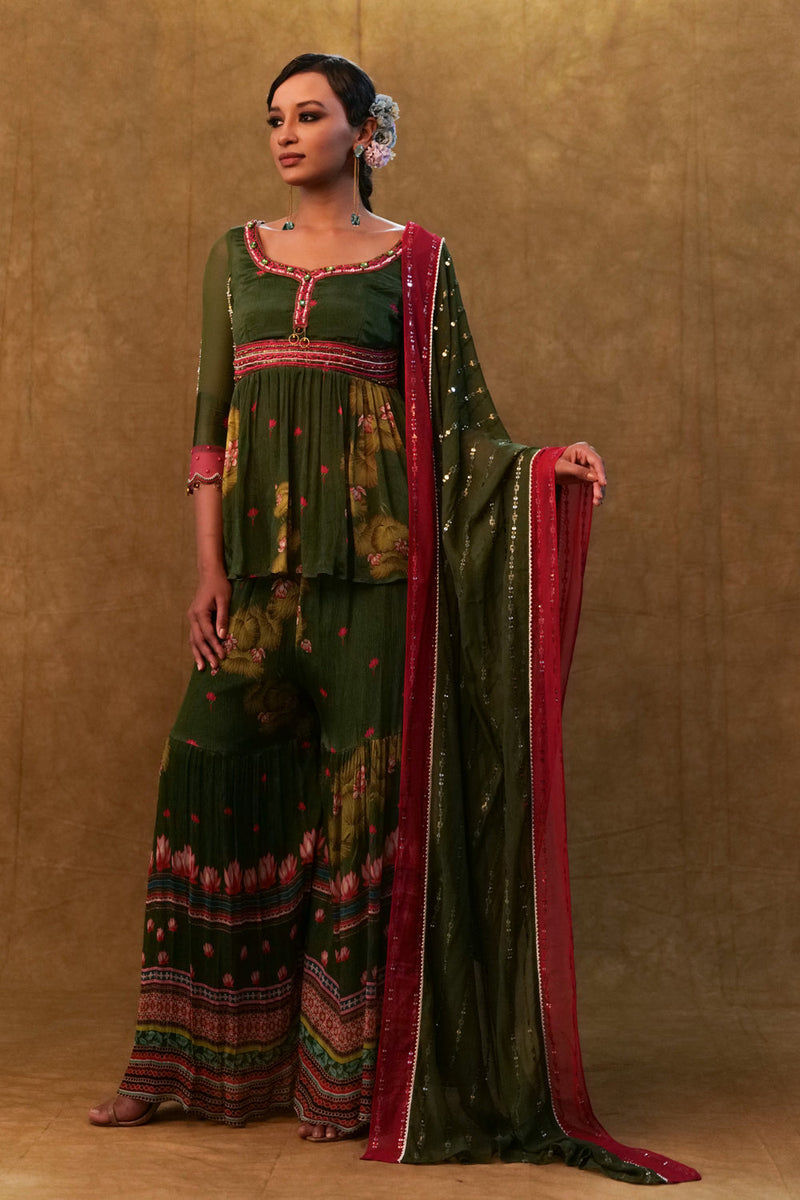 Green Printed Sharara Set Paired With Color Block Dupatta And A Peplum.