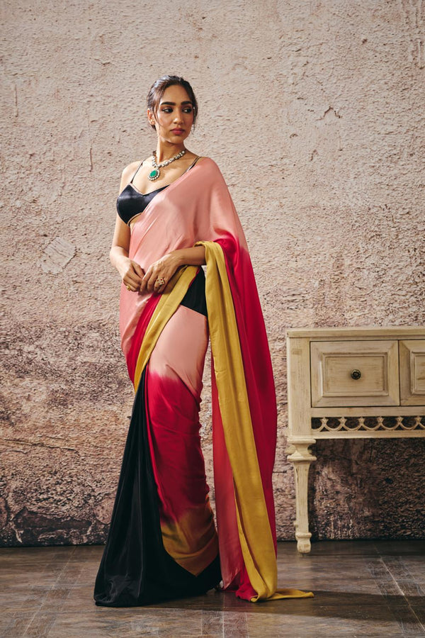 Black Blouse With Black And Red Peach Gold Ombre Saree