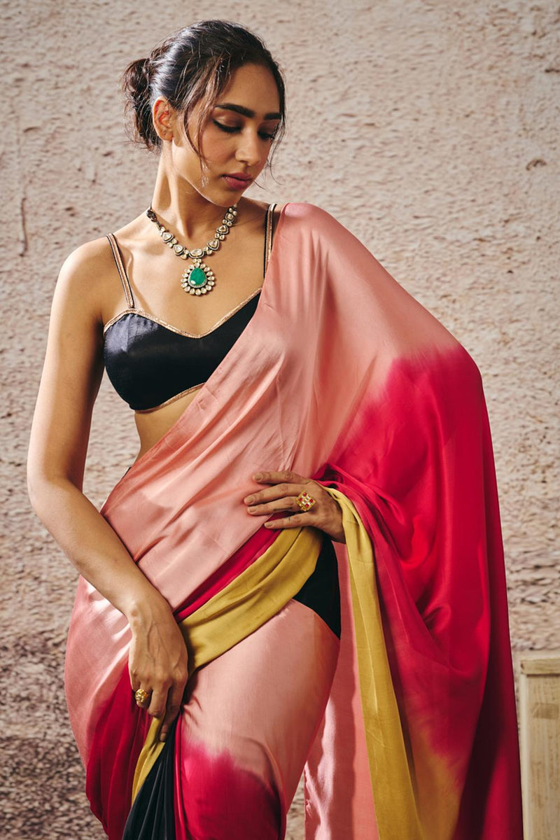 Black Blouse With Black And Red Peach Gold Ombre Saree