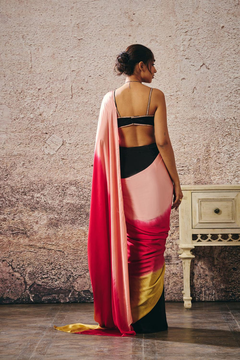 Black Blouse With Black And Red Peach Gold Ombre Saree