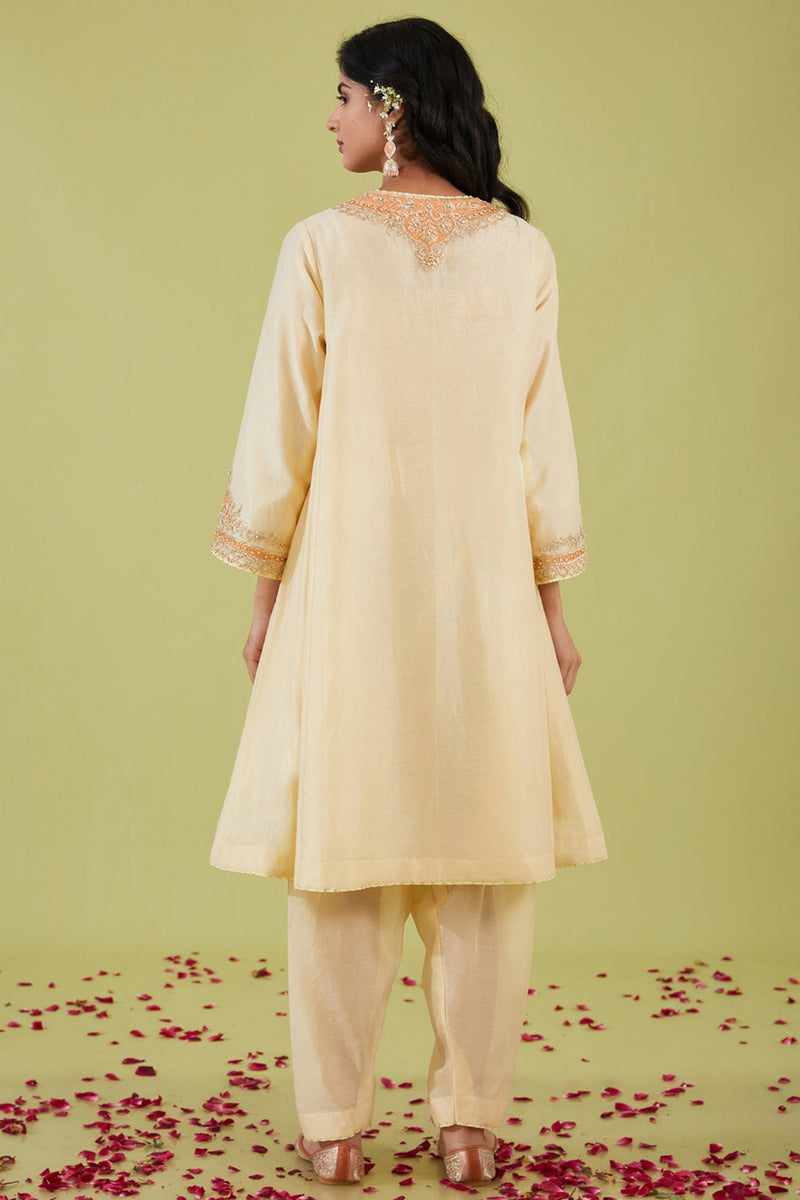 White Short Kalidar Kurta With Salwar And Peach Dupatta