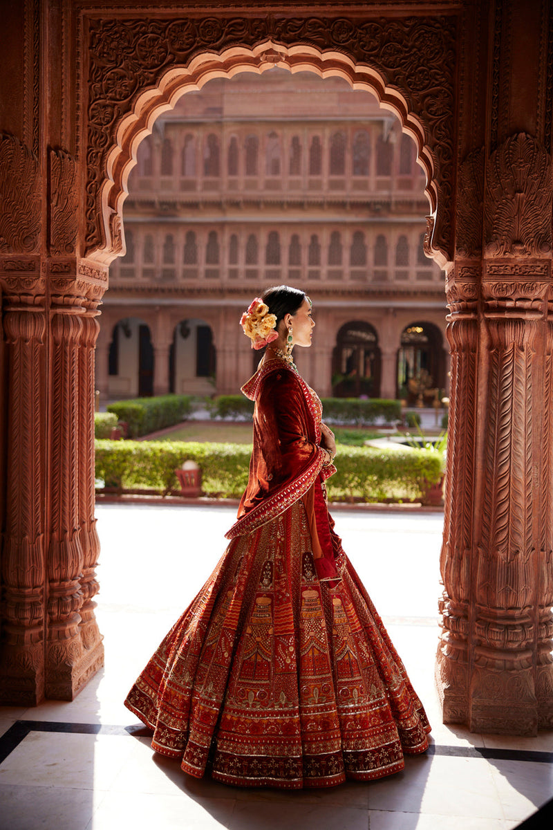 "Rewati" Rust Bridal Lehenga & Velvet Dupata