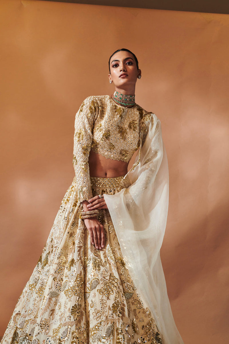 Ivory And Gold Heavily Embroidered Lehenga Set