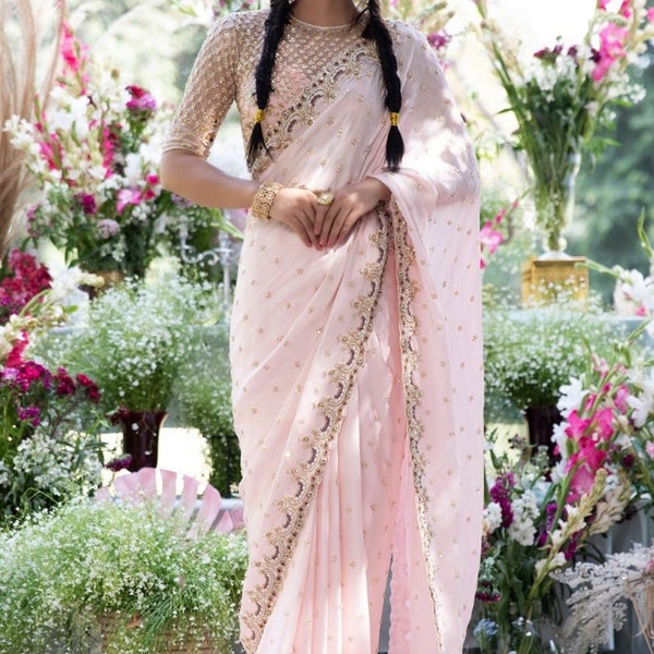 Pic: Styled in a baby pink coloured saree, Monica Gill looks ethereal